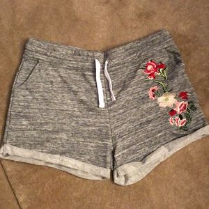 Super cute drawstring shorts with floral appliqué